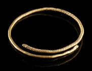 A EUROPEAN BRONZE AGE TWISTED GOLD RING
Circa 12th-9th century BC.
Ring made from twisted gold wire.
Diameter 35 mm; Gold! 2.81 g

Ex European pr...