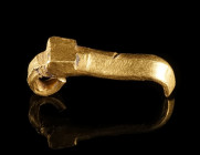 A HEAVY GOLD THORN FROM A MIGRATION PERIOD BUCKLE
Circa 5th-6th century AD.
Thorn from a very heavy gold buckle.
L 26 mm; Gold! 7.43 g

Ex Austri...