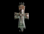 A BYZANTINE BRONZE RELIQUARY CROSS WITH CHRIST AND MARY
Circa 10th-12th century AD.
Small reliquary cross (enkolpion) depicting Christ crucified on ...