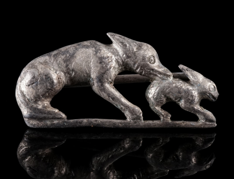 A MAGNIFICENT ROMAN SILVER HARE AND HOUND BROOCH
Circa 2nd-3rd century AD.
Det...