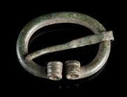 A BALTIC VIKING BRONZE PENANNULAR BROOCH
Circa 9th-11th century AD.
Small brooch with coiled profiled ends.
Diameter 25 mm (max.)

Austrian priva...