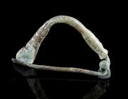 A PHRYGIAN BRONZE FIBULA
Circa 7th-6th century BC.
Fibula with arched and profiled bow. With spring and pin.
L 32 mm

From the collection of an A...