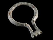 A ROMAN BRONZE RING BROOCH
Circa 3rd-4th century AD.
Late Roman ring brooch. Some remains of tinning; the original iron pin is not preserved.
L 76 ...