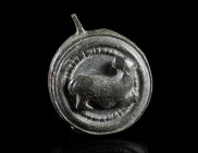 A ROMAN BRONZE LID WITH A HARE FROM A SEAL BOX
Circa 1st-2nd century AD.
Lid from a circular seal box with separately riveted zoomorphic form (hare)...