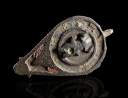 A ROMAN ENAMELLED BRONZE LID FROM A SEAL BOX
Circa 2nd century AD.
Lozengiform lid with lug from a seal box with separately riveted zoomorphic phall...