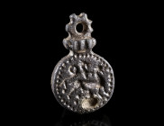 A BYZANTINE OR MEDIEVAL BRONZE STAMP SEAL PENDANT
Circa 10th-14th century AD.
Both sides decorated with a zoomorphic design; with an offset profiled...