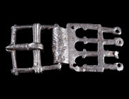 A LATE ROMAN MILITARY IRON BELT BUCKLE
Circa 4th-5th century AD.
Elaborate belt buckle with openwork plate. Well preserved, with some corrosion mark...