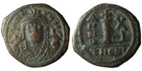 Maurice Tiberius. 582-602. AE decanummium. Antioch mint, year 11 = 592/593. D N MAV CN P AV, helmeted and cuirassed bust facing, holding mappa and eag...