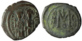 Justin II and Sophia (565-578). Æ 40 Nummi. Constantinople, year 8 (572/3). Nimbate figures of Justin and Sophia seated facing on double throne, holdi...