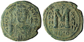 JUSTINIAN I (527-565). Follis. Nicomedia. Dated RY 29 (555/6).
Obv: D N IVSTINIANVS P P AVG.
Helmeted and cuirassed bust facing, holding globus cruc...