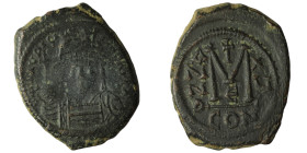 Justinian I. Follis (40 Nummi). RY 15 (541/2). Constantinople. (Sear-163). (Doc-I 39c). Anv.: D N IVSTINIANVS P P AVG, helmeted and cuirassed bust fac...