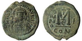 Maurice Tiberius AD 582-602. Constantinople Follis Æ D N MAVRC P P AVG, crowned, draped and cuirassed bust facing, holding cross on globe and shield /...
