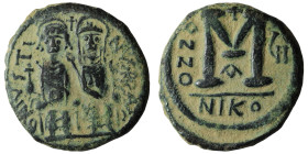 Justin II with Sophia (565-578) AE Follis Nicomedia.
Obv: D N IVSTINVS P P AVG, Justin, holding globus cruciger, and Sophia, holding cruciform sceptr...