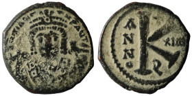 MAURICE TIBERIUS (582-602). Half Follis. Antioch.
Ob v: d N mAYΓI CN P AYΓ.
Crowned facing bust, wearing consular robe, holding mappa and eagle-tipp...