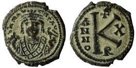 MAURICE TIBERIUS (582-602). Half Follis. Antioch.
Ob v: d N mAYΓI CN P AYΓ.
Crowned facing bust, wearing consular robe, holding mappa and eagle-tipp...