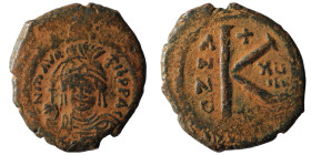 Maurice Tiberius Æ 20 Nummi. Thessalonica, dated RY 17 = AD 598/9. ∂ N mAVRC TIЬ P P AV, crowned and cuirassed bust facing, holding globus cruciger an...