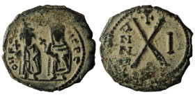 PHOCAS, with LEONTIA. 602-610 AD. Æ Half Follis. Antioch mint. Dated RY 1 (602/3 AD). ON FOCA NEPE AV, Phocas, holding globus cruciger, and Leontia, h...