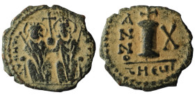 Justin II with Sophia (565-578) AE Decanummium ) Antioch, Dated RY 10 (574/5).
Obv: Justin and Sophia enthroned facing, holding scepters and globus c...