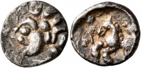 CELTIC, Central Europe. Vindelici. Early 1st century BC. Quinarius (Silver, 13 mm, 1.98 g, 8 h). Celticized male head to left. Rev. Horse springing le...