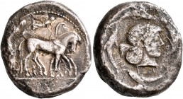 SICILY. Syracuse. Deinomenid Tyranny, 485-466 BC. Tetradrachm (Silver, 24 mm, 15.99 g, 1 h), circa 475-470. Charioteer driving quadriga walking to rig...