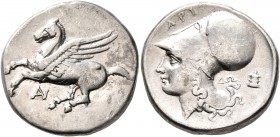 AKARNANIA. Anaktorion. Circa 350-300 BC. Stater (Silver, 21 mm, 8.29 g, 12 h). Pegasus flying left; below, monogram of AN. Rev. API Head of Athena to ...