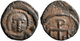 Justinian I, 527-565. Nummus (Bronze, 9 mm, 0.42 g, 1 h), Carthage. Helmeted (?) and draped bust facing. Rev. Christogram with A and ω flanking. DOC. ...