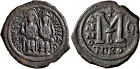 Justin II, with Sophia, 565-578. Follis (Bronze, 31 mm, 13.82 g, 7 h), Nicomedia, RY 5 = 569/570. D N IVSTINVS P P AVG Justin II, holding globus cruci...