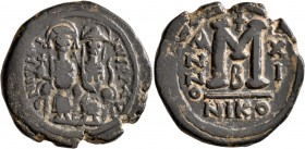 Justin II, with Sophia, 565-578. Follis (Bronze, 28 mm, 12.70 g, 7 h), Nicomedia, RY 11 = 575/6. D N IVSTINVS P P AVG Justin II, holding globus crucig...