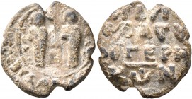 Byzantine Seals. Seal (Lead, 19 mm, 4.93 g, 12 h), circa 6th-8th centuries. Two nimbate Saints standing facing. Rev. Inscription in four lines. Very f...