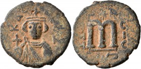 ISLAMIC, Umayyad Caliphate. temp. Mu'awiya I ibn Abi Sufyan, AH 41-60 / AD 661-680. Fals (Bronze, 22 mm, 5.30 g, 7 h), Arab-Byzantine type, Hims. Impe...