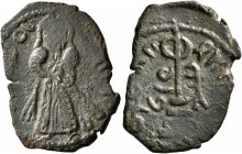 ISLAMIC, Umayyad Caliphate. temp. 'Abd al-Malik ibn Marwan, AH 65-86 / AD 685-705. Fals (Bronze, 15x22 mm, 2.07 g, 6 h), 'Standing Caliph' type, uncer...