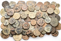 A lot containing 76 bronze coins. All: Islamic. About very fine to very fine. LOT SOLD AS IS, NO RETURNS. 76 coins in lot.