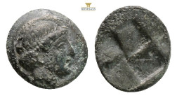 Greek coins AE 0,66 g. 9,1 mm. Bare head right, Quadripartite incuse square.
