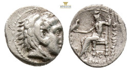 Kings of Macedon, Alexander III \ the Great \ AR Obol, 0,64 g. 9,1 mm. 336-323 BC. Obv: Head of Herakles right, wearing lion skin.Rev: Zeus seated lef...