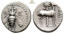 IONIA. Ephesus. Drachm, 4 g. 17 mm. (Circa 202-133 BC). Dionysopoulos, magistrate. Obv: Bee. Rev: Stag standing right, palm tree behind.