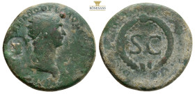 Trajan. AD 98-117. Æ As (24,1 mm, 6,7 g.) Rome mint, for circulation in Syria. Struck AD 116. Radiate bust right, wearing aegis / S C within oak wreat...