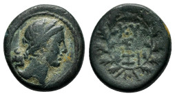 MYSIA.Cyzicus.(2nd-1st centuries BC).Ae.

Obv : Head of Kore right.

Rev : Monogram between KY-ZI, all within wreath.

Condition : Good very fin...