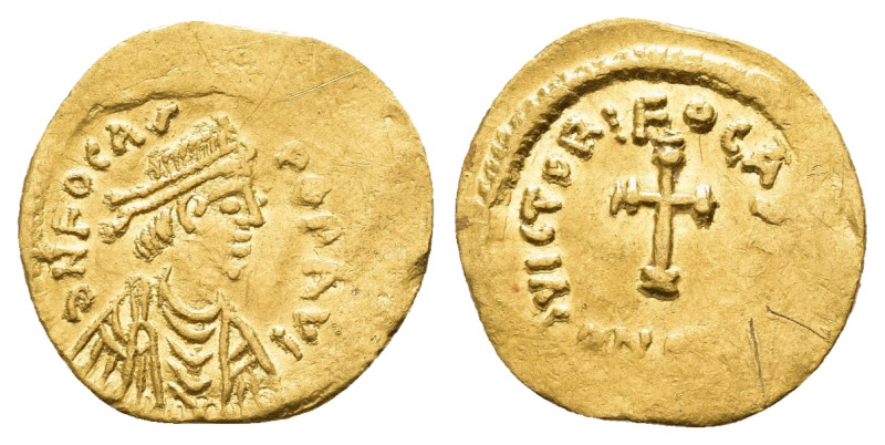 PHOCAS.(602-610).Constantinople.Tremissis.

Obv : δ N FOCAS P P AV.
Diademed, dr...