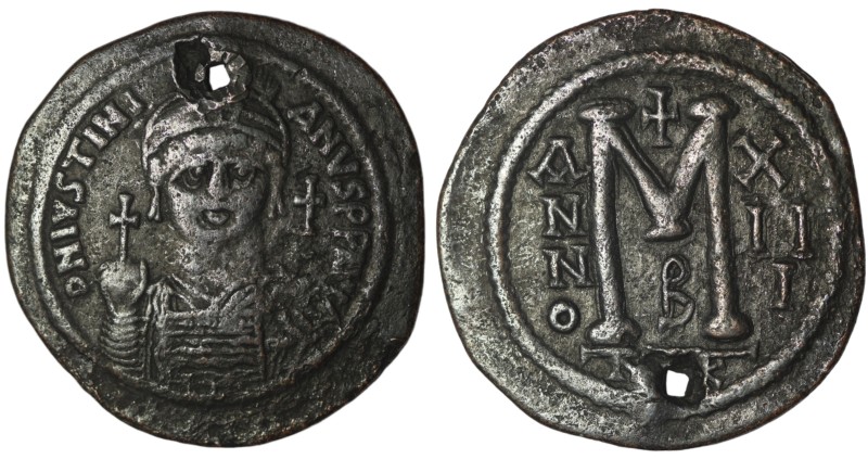 Justinian I. (527-565 AD) Æ Follis. Nikomedia. Obv: crowned bust facing holding ...