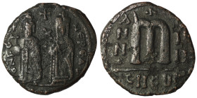 Phocas and Leonita. (602-610 AD) Æ Follis. Theoupolis. Obv: Phocas and Leonita standing facing. Rev: ANNO / M. 27mm, 7,68g
