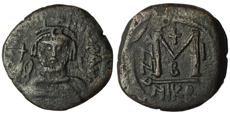 Heraclius. (610-641 AD) Æ Follis. Nikomedia. Obv: Heraclius holding globus cruci...