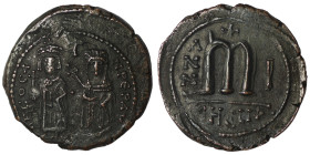 Phocas and Leonita. (602-610 AD) Æ Follis. Theoupolis. Obv: Phocas and Leonita standing facing. Rev: ANNO / M. 31mm, 9,70g