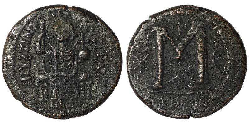 Justinian I. (527-565 AD) Follis. Theoupolis. Obv: Justinian sitting enthroned f...