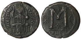 Justinian I. (527-565 AD) Follis. Theoupolis. Obv: Justinian sitting enthroned facing. Rev: ANNO M. 33mm, 17,16g