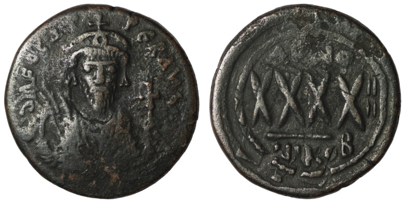 Phocas. (605-606 AD). Æ 40 Nummi. Nikomedia. Obv: bust of Phocas facing. Rev: AN...