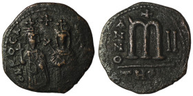 Phocas and Leonita. (602-610 AD) Æ Follis. Theoupolis. Obv: Phocas and Leonita standing facing. Rev: ANNO / M. 27mm, 7,70g