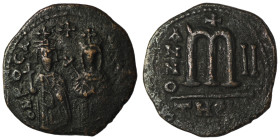 Phocas and Leonita. (602-610 AD) Æ Follis. Theoupolis. Obv: Phocas and Leonita standing facing. Rev: ANNO / M. 27mm, 7,70g