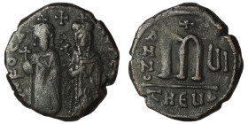 Phocas and Leonita. (602-610 AD) Æ Follis. Theoupolis. Obv: Phocas and Leonita standing facing. Rev: ANNO / M. 27mm, 8,93g