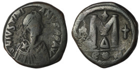 Justinian I. (527-565 AD) Æ Follis. Constantinople. Obv: D N IVSTINIANVS PP AVI. diademed bust right. Rev: M between stars, cross above. 31mm, 16,75g...