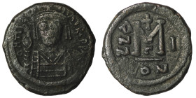 Tiberius II. Constantine. (578-582 AD). Follis. Constantinople. Obv: cuirassed bust facing holding globus cruciger. Rev: ANNO / M. cross above. 28mm, ...